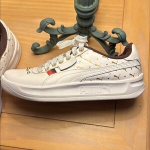 Puma Cali studs - White Sneakers with Gold Accents